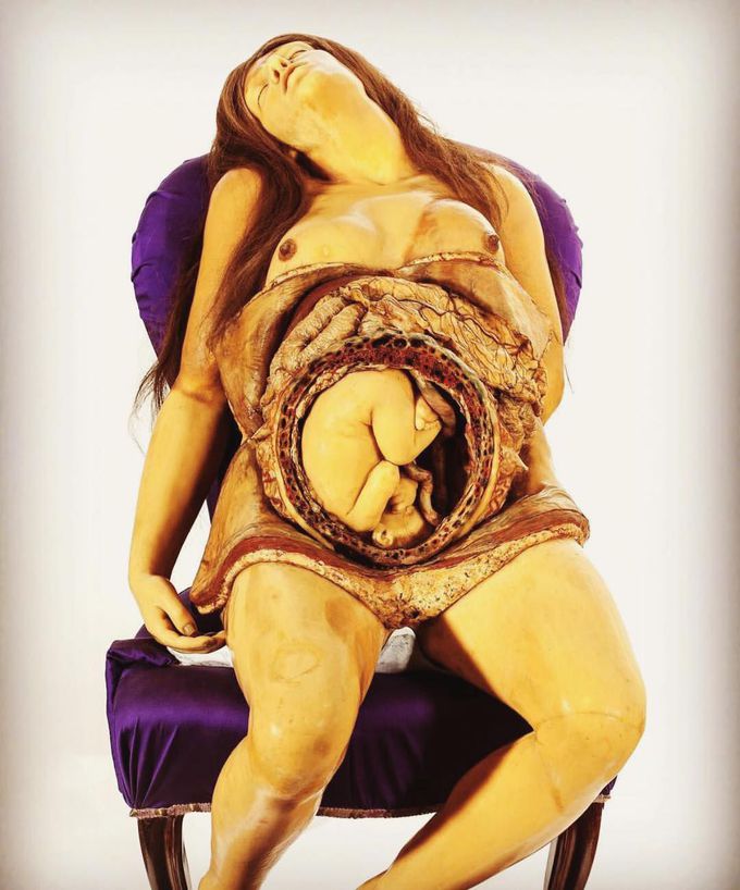 Waxy model of pregnant woman
