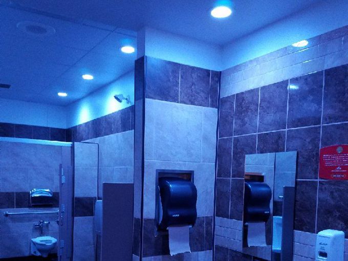 What is the purpose of blue lighting in public bathrooms? MEDizzy