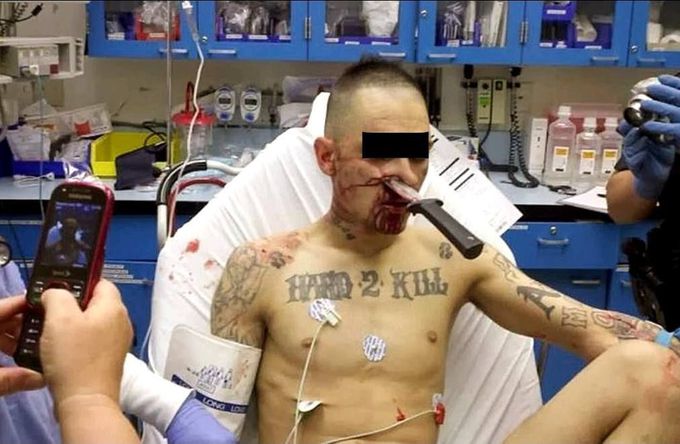 His tattoo "HARD TO KILL" is really on point!  